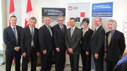 At the funding announcement at Barrick Gold's headquarters in Toronto, from left: Robert Krcmarov, senior vice-president of global exploration, Barrick Gold; Patrice Sawyer, vice-president of research and francophone affairs, Laurentian University; Gary Goodyear, Minister of State for Science and Technology; Joe Oliver, Minister of Natural Resources; Carl Weatherell, executive director and CEO, CMIC; Janet Walden, acting president, NSERC; Michael Lesher, professor and research chair in mineral exploration and principal investigator, Laurentian University; and Francois Robert, vice-president and chief geologist for global exploration, Barrick Gold. Photo by Salma Tarikh.