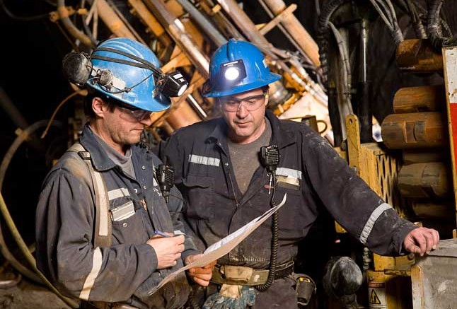 Mining engineers consult with one another at Agnico Eagle's Goldex gold project. Source: Agnico Eagle