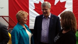 At the funding announcement for the Centre for Northern Innovation in Mining (CNIM) at Yukon College, from left: Yukon College president Karen Barnes, Prime Minister Stephen Harper and CNIM executive director Shelagh Rowles. Source: Yukon College