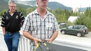 GroundTruth Exploration president Shawn Ryan holds an exploration drone in Dawson City, Yukon, as Taku Gold director Mark Fekete looks on. Photo: Gwen Preston