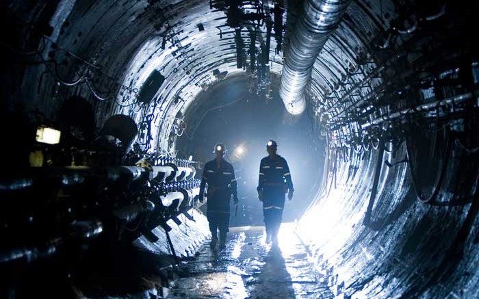 Miners walk along underground tunnels at the Cigar Lake project in Saskatchewan. Source: Cameco