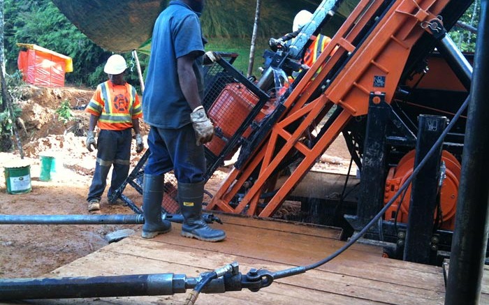 Drillers at the Imwauna gold target at PNG Gold's Normanby gold project in Papua New Guinea. Source: PNG Gold