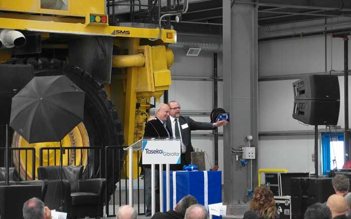 B.C. Minister of Energy and Mines Bill Bennett (left) joins Taseko Mines president and CEO Russell Hallbauer onstage at the company's Gibraltar mine-expansion celebration in B.C. Photo by Gwen Preston.