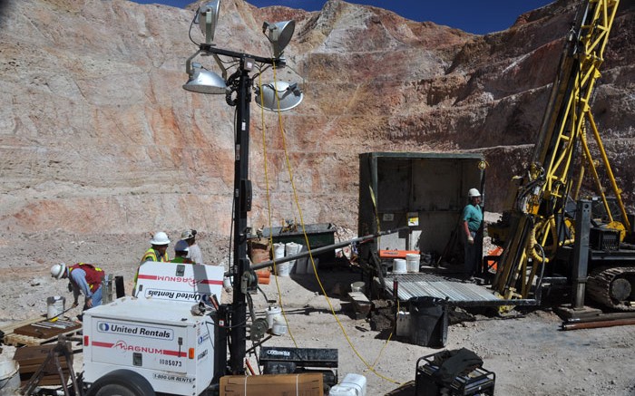 Workers at a drill site in a historic pit at Castle Mountain Mining's namesake gold project in San Bernardino County, California, 90 km south of Las Vegas. Source: Castle Mountain Mining