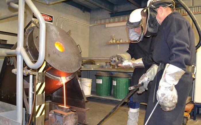 Workers pour gold at LionGold's Ballarat gold mine in Victoria, Australia. Credit:  LionGold