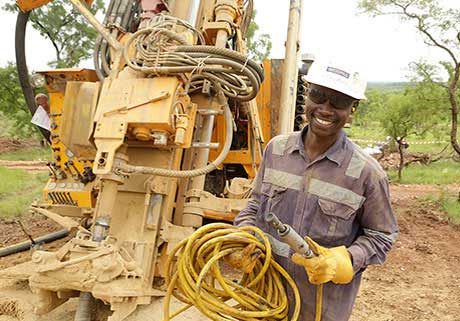 A worker at Ampella Mining's Batie West project in Burkina Faso. Credit: Ampella Mining