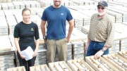 From left, geologists Julia Lane and Richard Phillips with ATAC Resources president Rob Carne, in the core storage area of the Rackla gold project in the eastern Yukon. Photo by Gwen Preston.
