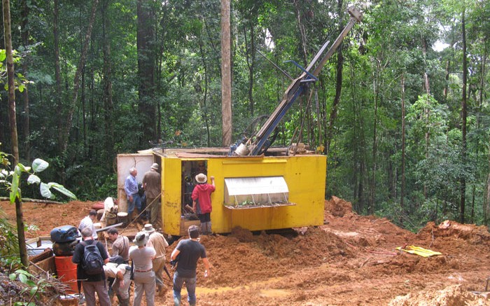 Management and visitors at a drill site targeting the Montagne d'Or gold deposit at Columbus Gold and Nordgold's Paul Isnard gold project in French Guiana. Credit: Columbus Gold