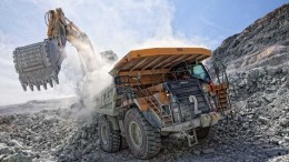 Machines move material in the pit at Primero Mining's Black Fox gold mine in Timmins, Ontario.  Credit: Primero Mining