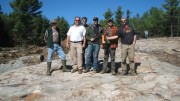 Ginguro Exploration personnel at the Eastern Reef paleo-placer gold deposit at Ginguro and Endurance Gold's Pardo gold project northeast of Sudbury, Ont., from left: director Doug Hunter; president and CEO Richard Murphy; chief financial officer Guy Mahaffy; and geologists Wesley Whymark, Winston Whymark and Peter van Walraven. Photo by John Cumming