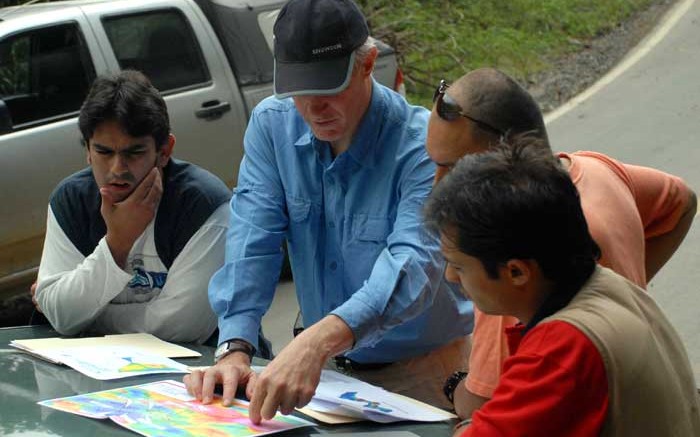 Geologists examining maps at Continental Gold's Buritic project in Colombia. Credit: Continental Gold