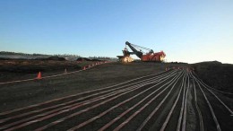 A shovel loads oilsands into a haul truck at Syncrude's Aurora mine in Alberta. Credit: Syncrude