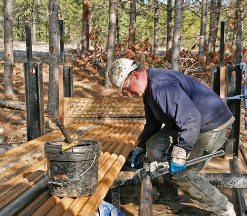 A worker handles drill rods at Duluth Metals and Antofagasta's Twin Metals copper-nickel-PGM project in Minnesota. Credit: Duluth Metals