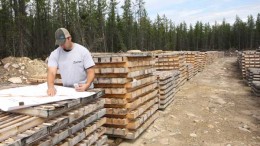 Denison Mines senior project geologist Chad Sorba reviews drill core data at the Wheeler River project in Saskatchewan. Credit: Denison Mines