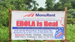 An educational sign on the Ebola virus at Aureus Mining's New Liberty open-pit gold project in northeastern Liberia. Credit: Aureus Mining