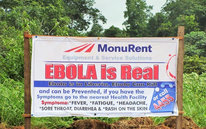 An educational sign on the Ebola virus at Aureus Mining's New Liberty open-pit gold project in northeastern Liberia. Credit: Aureus Mining