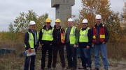 At Pure Gold Mining's historic Madsen gold property in northwestern Ontario, from left: Darin Labrenz, president and CEO; Blaine Monaghan, director of investor relations; Phil Smerchanski, director of geoscience; Sean Tetzlaff, CFO; Lenard Boggio, director; and Darren O'Brien, vice-president of exploration.  Photo by Matthew Keevil.