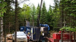 A worker stands at a drill site this summer at Trevali Mining's Stratmat zinc-lead-silver-copper-gold project, 45 km southwest of Bathurst, New Brunswick. Credit: Trevali Mining