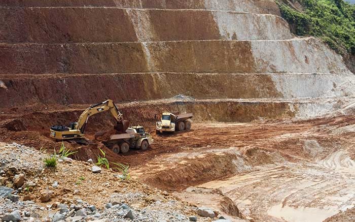 Machines in the pit at Petaquilla Minerals' Molejon gold mine in Panama. Credit: Petaquilla Minerals