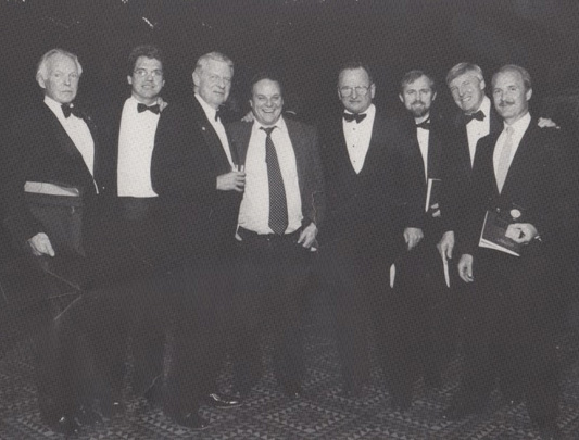 At a mining event in Toronto (circa 1989?), from left: Mort Brown, James Borland, Alfred Powis, Pat Sheridan, Bill James, Olav Svela, John Cooke and Steven Roman.