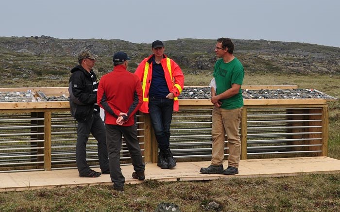 At Agnico Eagle Mines' Amaruq gold project in Nunavut in mid-2014, from left: Guy Gosselin, vice-president of exploration; Alain Blackburn, senior vice-president of exploration; Marc Ruel, director of mine geology and grade control; and Jerome Lavoie, project geologist. Credit: Agnico Eagle Mines