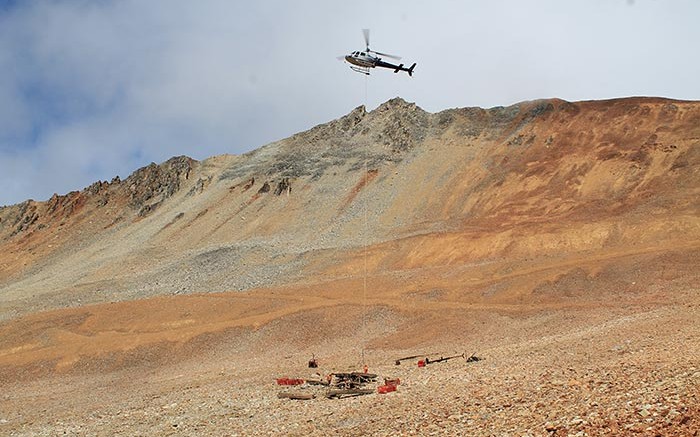 A helicopter delivers supplies at Amarc Resources' IKE copper-moly-silver project in south-central B.C. Credit: Amarc Resources