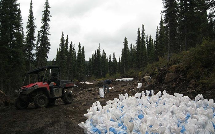 Workers collect a bulk sample at Commerce Resources' Eldor REE project in Quebec's Nunavik region. Credit: Commerce Resources