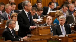 Canada's Finance Minister Joe Oliver (standing) discusses the 2015 budget in parliament in April. Source: Joe Oliver MP