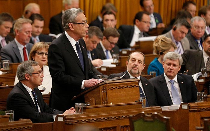 Canada's Finance Minister Joe Oliver (standing) discusses the 2015 budget in parliament in April. Source: Joe Oliver MP