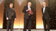 Simon Houlding (middle) accepts the 2015 Vale Medal for Meritorious Contributions to Mining from the Canadian Institute of Mining, Metallurgy and Petroleum in May. Credit: EduMine