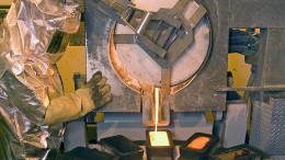 A worker pours gold at Barrick Gold's refinery at the Goldstrike gold mine in Nevada.  Credit: Barrick Gold