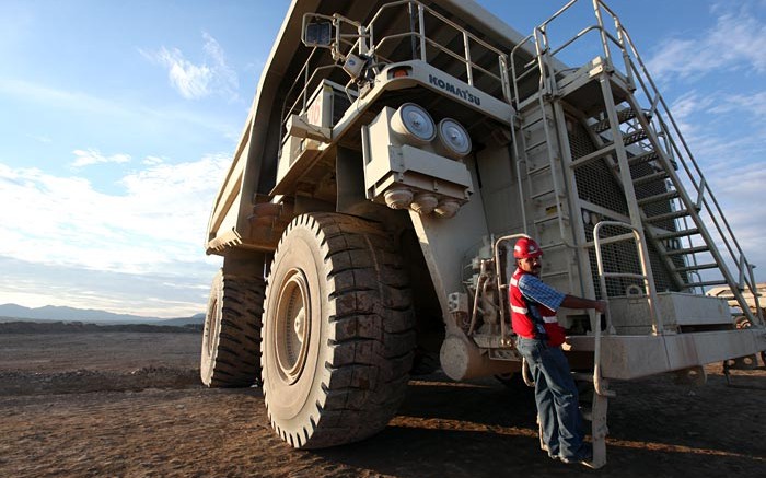 An employee climbs into a mining truck at Goldcorp's Peasquito polymetallic mine in Mexico. Source: Goldcorp