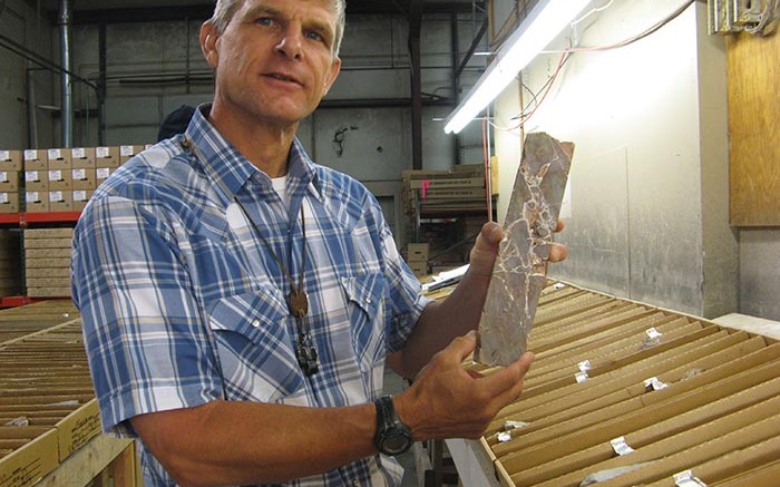 Mac Jackson, Gold Standard Ventures' vice-president of exploration, shows off a core sample from the Railroad gold project in northern Nevada.  Photo by Alisha Hiyate