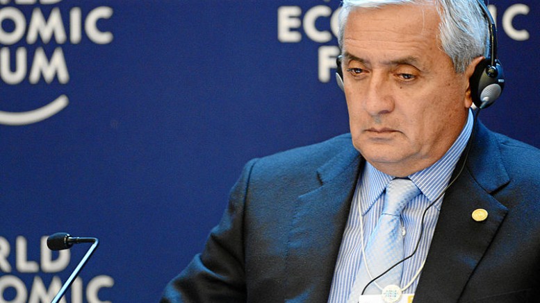 Otto Perez Molina, President of Guatemala, looks at his notes during the Forum Debate: 'Winning the War on Drugs' at the Annual Meeting of the World Economic Forum in Davos, Switzerland, Jan. 24, 2013. Credit: World Economic Forum, Photo by Michael Wuertenberg.