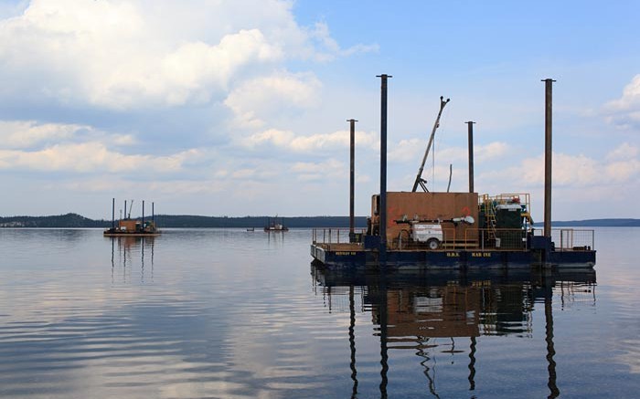 Drill rigs on barges at Fission Uranium's Patterson Lake South uranium project in northern Saskatchewan. Source: Fission Uranium