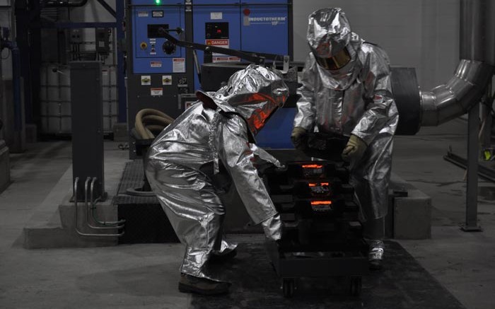 Workers pour dor at Rubicon Minerals' Phoenix gold mine in mid-2015, shortly before the company suspended the mine to "enhance its geological model." Credit: Rubicon Minerals