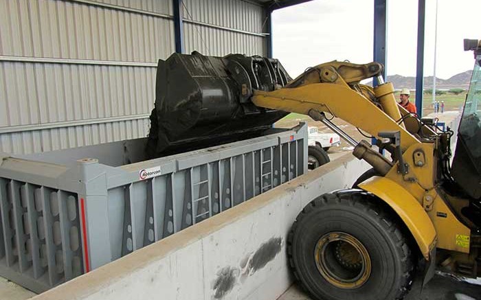 Loading a container with copper concentrate at Nevsun's Bisha copper-gold mine in Eritrea. Credit: Nevsun