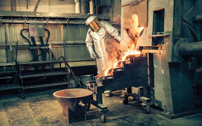 A worker pours gold dor at St Andrew Goldfields' Holt mill in Timmins, Ontario. Credit: St Andrew Goldfields