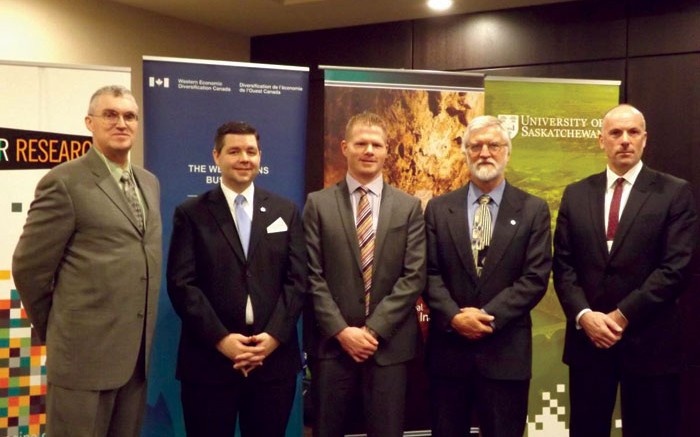 Following the research cluster announcement in Saskatoon, from left: Al Shpyth, IMII executive director; Jeremy Harrison, Saskatchewan's Minister Responsible for Innovation; Todd Steen, general manager of Agrium's Vanscoy potash mine; Jim Basinger, University of Saskatchewan associate VP of research; and David Malloy, University of Regina VP of research. Credit: IMII