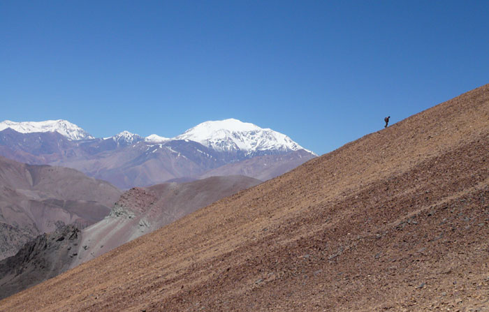 A hiker at McEwen Mining's Los Azules   advanced-stage porphyry copper project located in the cordilleran region of San Juan Province, Argentina near the border with Chile. Credit: McEwen Mining