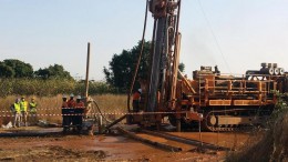 Workers with a reverse-circulation drill at Semafo’s Natougou gold project, 320 km east of Ouagadougou, Burkina Faso.  Credit: Semafo
