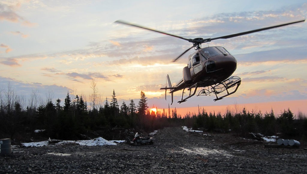 A helicopter near Balmoral Resources' Bug Lake and Martiniere West gold deposits, part of the larger Detour Trend project in central Quebec. Credit: Balmoral Mining.