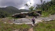 Claudio Cruz charging towards the ore pile at the Las Peñas property, near the village of La Zarza, Ecuador. Photo by Keith Barron.