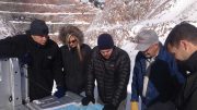 Back-of-the-cab geology meeting with McEwen Mining while visiting the Gold Pick pit at the Gold Bar gold project in Nevada, from left: Xavier Ochoa, president and CEO; Christina McCarthy, director of corporate development; analyst Michael Hocking; Bruce Burke, director of operations and logistics; and Simon Quick, vice-president of projects. Photo by Lesley Stokes.