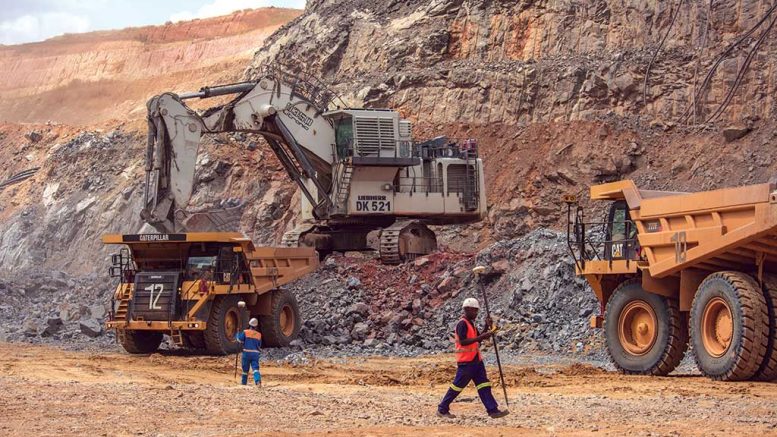 Workers and heavy equipment in a pit at Randgold Resources’ Tongon gold mine in Côte d’lvoire. Credit: Randgold Resources.