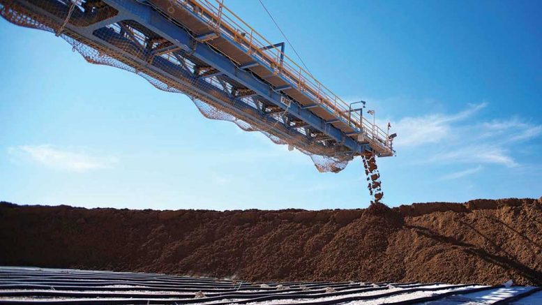 Material leaves a conveyor at BHP Billiton’s Escondida copper mine in Chile. Credit: BHP Billiton.