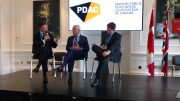 At the Canadian Mining Symposium at Canada House in London, U.K., in May 2017, from left: Barrick Gold president Kelvin Dushnisky and Goldcorp CEO David Garofalo in conversation with session moderator Greg Huffman, managing director and global head of mining sales at Canaccord Genuity. Photo by John Cumming.