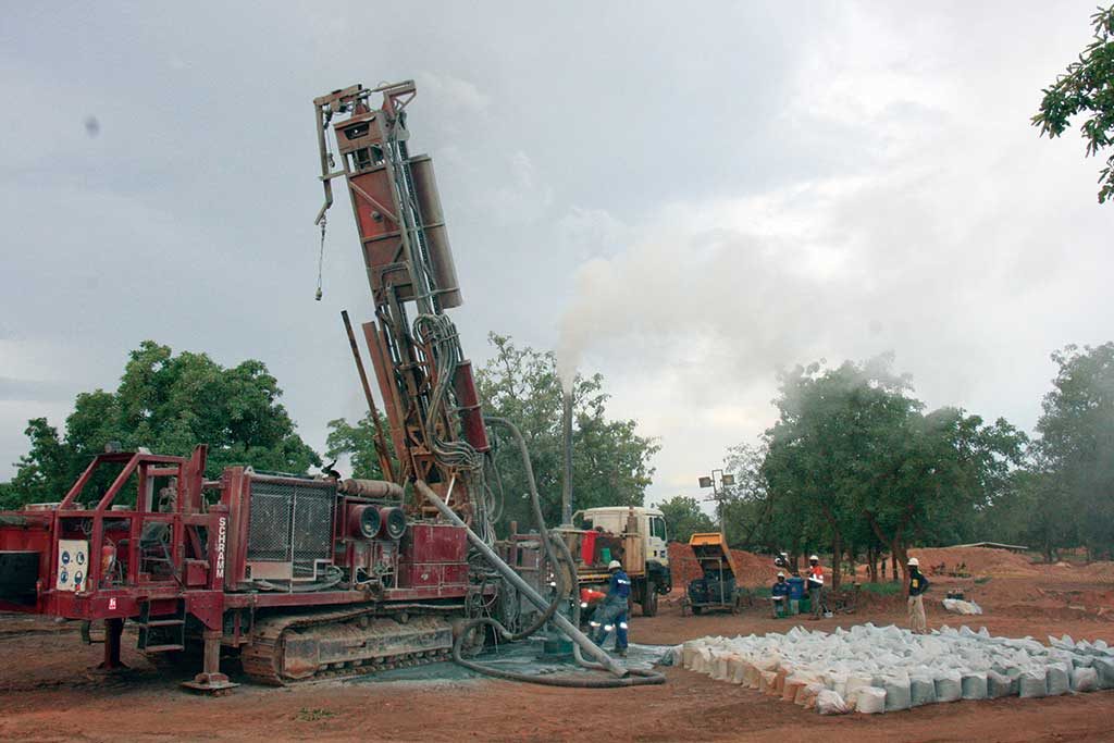 A drill crew at work at Cardinal Resources’ Namdini gold deposit in northern Ghana, 40 km south of the Burkina Faso border. Credit: Cardinal Resources.