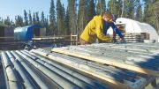 Balmoral Resources’ geologist Jordan Vervaeke (left) and GIS manager Ken Kuiper examine core from the New Bug NW gold discovery on the Martiniere property in Quebec. Credit: Balmoral Resources.