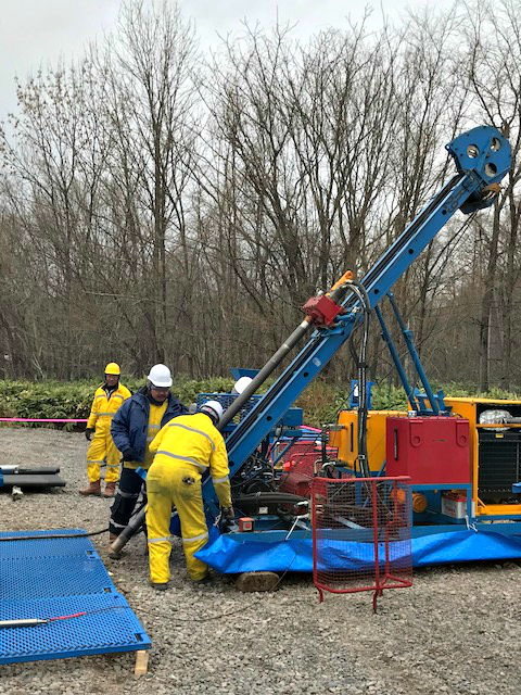Crew members setting up one of Japan Gold's three diamond drill rigs in Japan. Credit: Japan Gold.